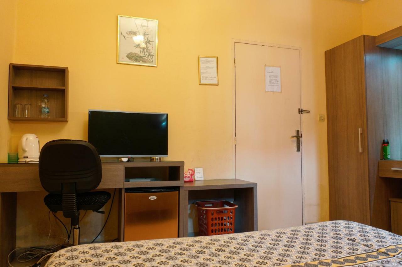 Petit Motel Beijing Abidjan Bagian luar foto