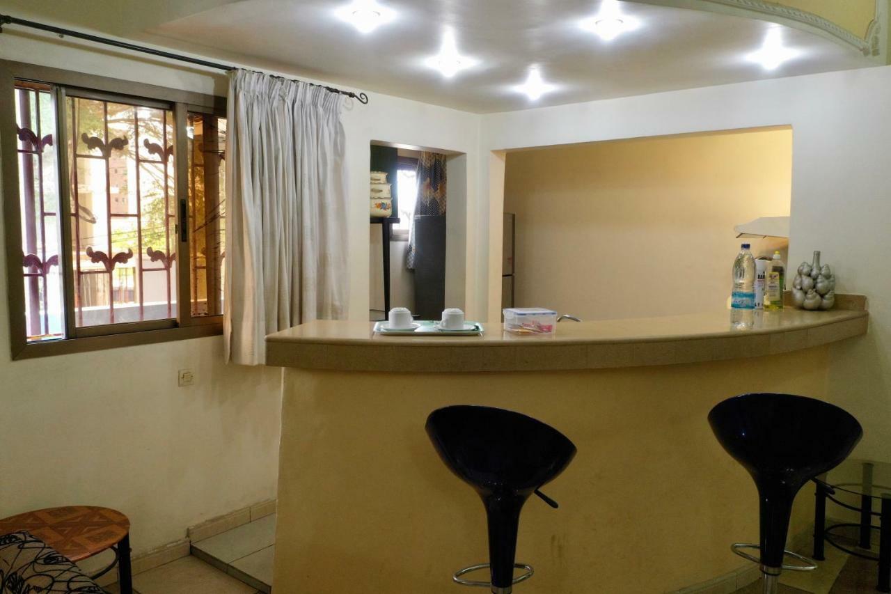Petit Motel Beijing Abidjan Bagian luar foto